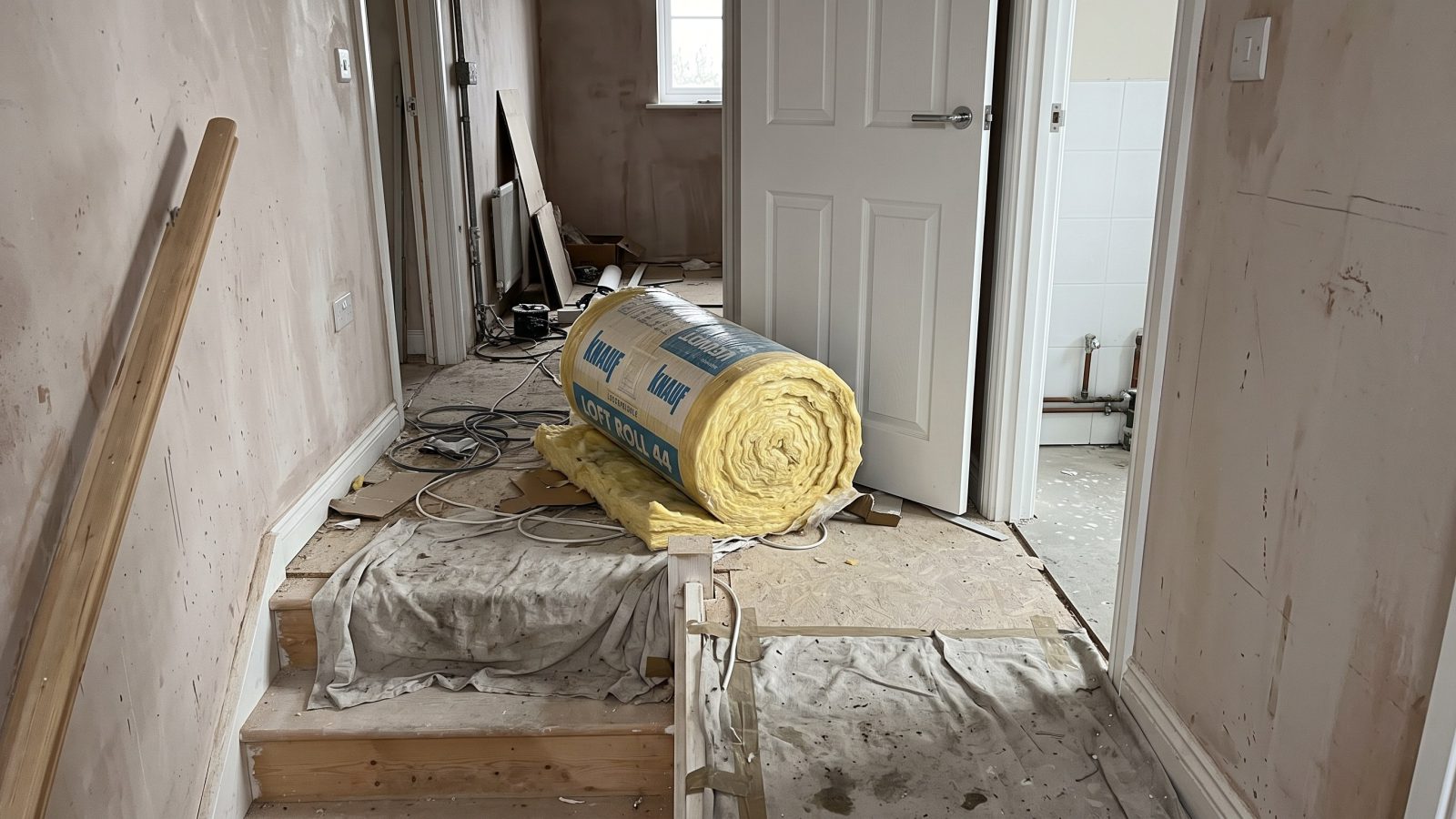 Loft insulation dumped on a new-build landing