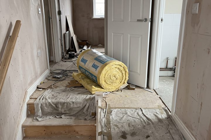 Loft insulation dumped on a new-build landing