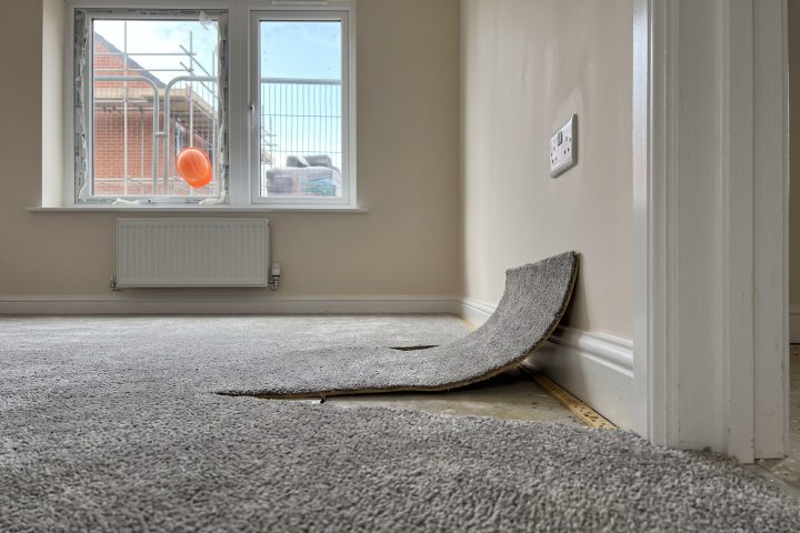 Empty finished new-build living room with keys on the windowsill